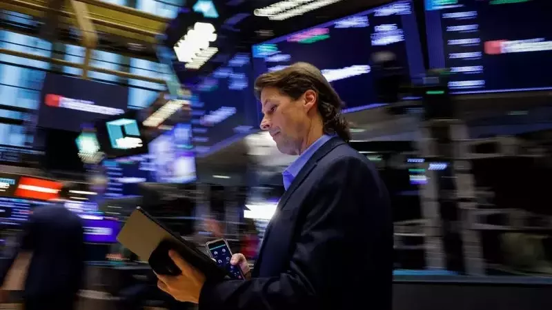 Futures slip as investors await key inflation report