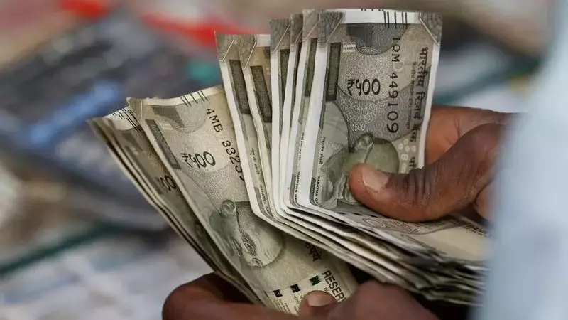 Indian Rupee Faces Pressure Amid Dollar Surge