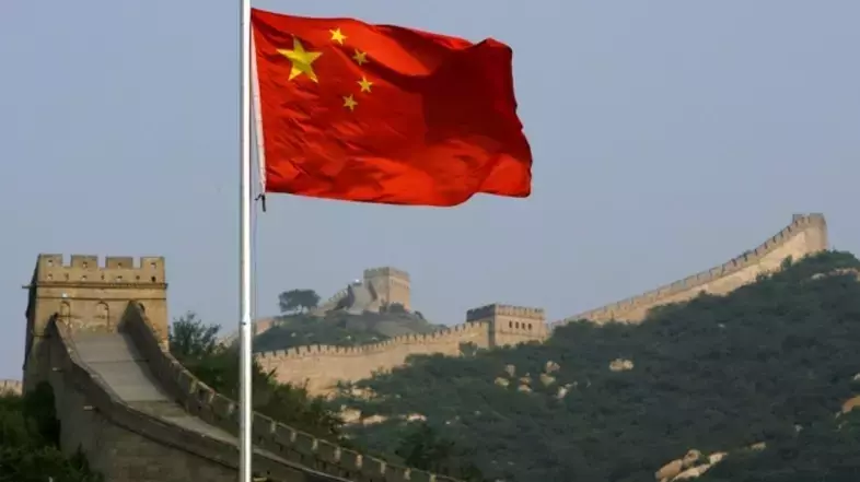 China's Central Bank Sets Yuan Reference Rate Amidst Managed Floating Exchange System
