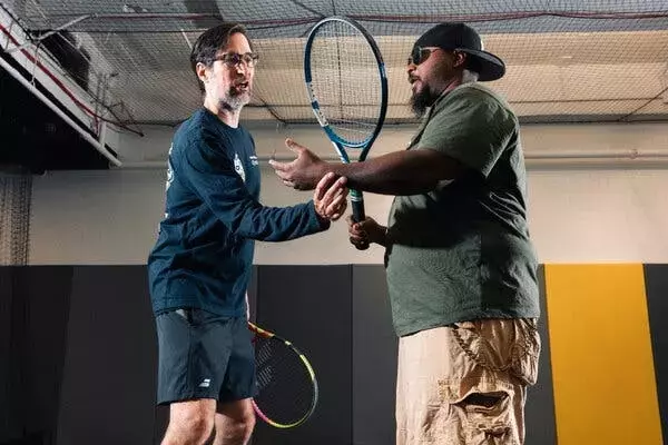 Vision Impairment No Barrier to Passionate Tennis Play